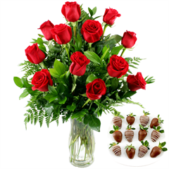 12 red roses in a glass vase, includes long stem roses and greenery 