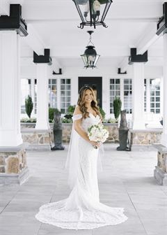 Roses & White Ranunculus Bridal Bouquet - Round Clutch Style