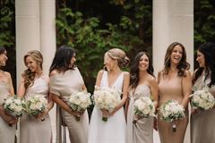 White Roses, Baby's Breath & Eucalyptus Bridesmaid Bouquet